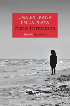 UNA EXTRAÑA EN LA PLAYA UNA EXTRAÑA EN LA PLAYA